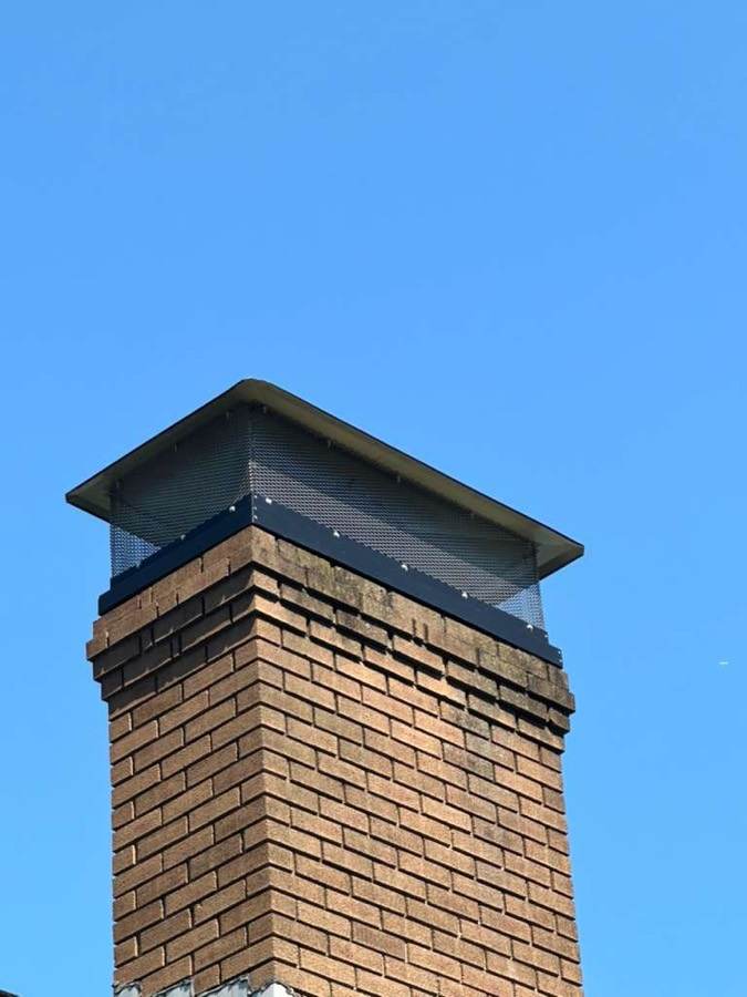 New chimney cap and crown on a brick chimney