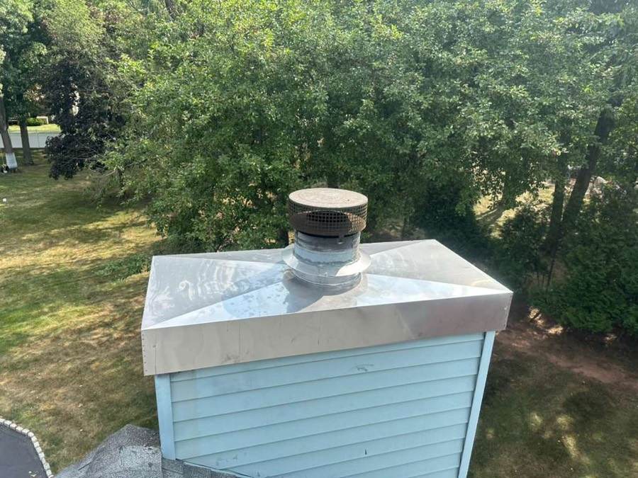 Chimney chase cover and flashing to stop leaks
