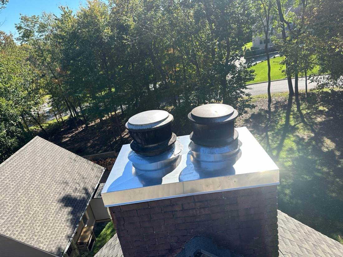 Clean chimney flues with new stainless caps