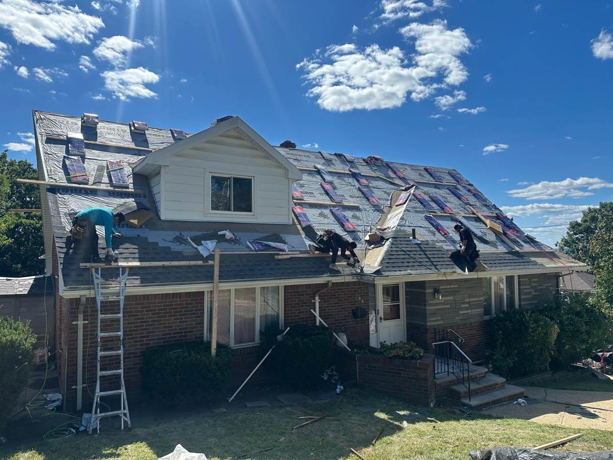 Vision Roofing & Chimney crew working on a home in New Jersey