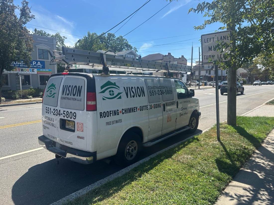 Vision Roofing & Chimney service van